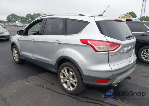2014 Ford Escape Titanium z USA, uszkodzony, nr VIN 1FMCU0J98EUC28001